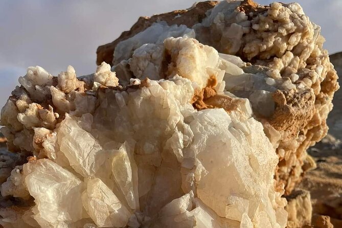 2Days to White Desert and Bahariya Oasis tour From Cairo & Giza - Black Desert: dark hills above the sand