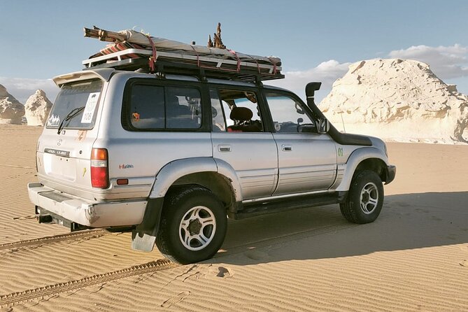 4-Day White Desert Camping Trip from Cairo - Day 2: Aqapat, Karaween dunes, and Magic Spring