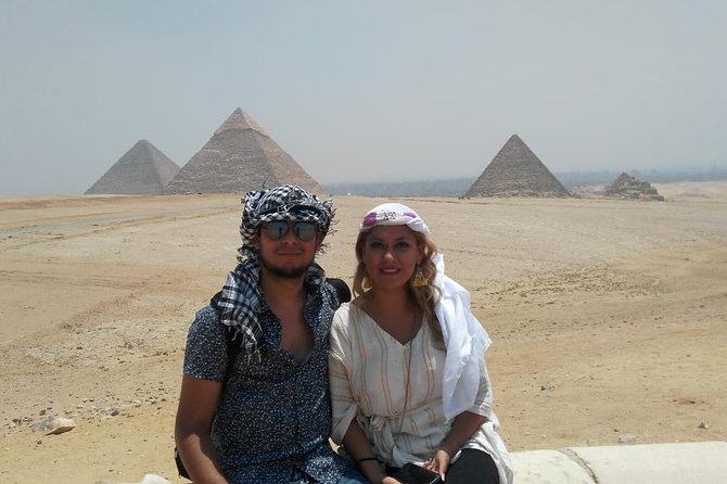 All Inclusive Private Trip to Giza Pyramids,sphinx , Camel ride - Facing the Great Pyramid at Giza