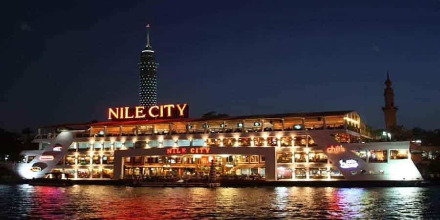 Cairo: Buffet Dinner Cruise with Folkloric Show - Boarding the boat and finding a seat