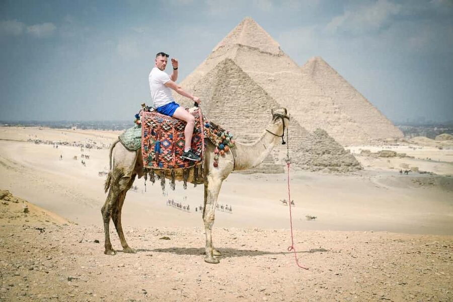 Cairo Day Tour: Pyramids, Museum, Camel Ride & Local Lunch - Seeing Khufu, Khafre and Menkaure at Giza