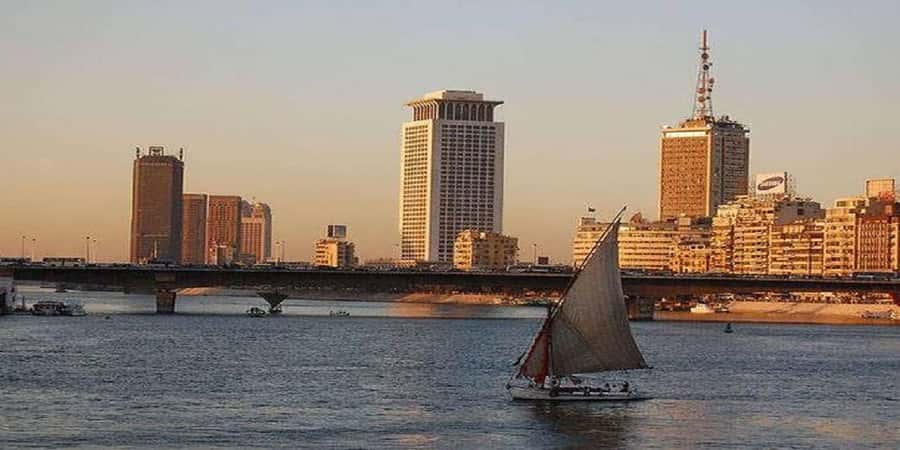 Cairo: Felucca ride on The Nile River with Meals - Boarding a traditional felucca on the Nile
