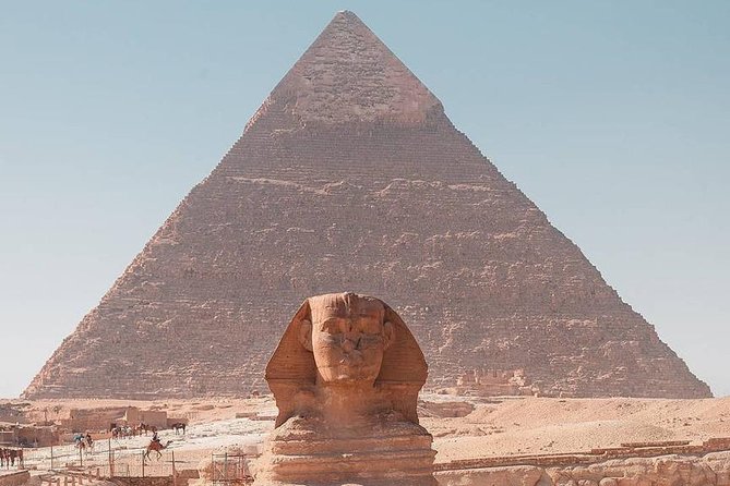 Cairo Full Day-Pyramids & Sphinx & Egyptian Museum from Hurghada - Seeing Cairo Tower through the bus window