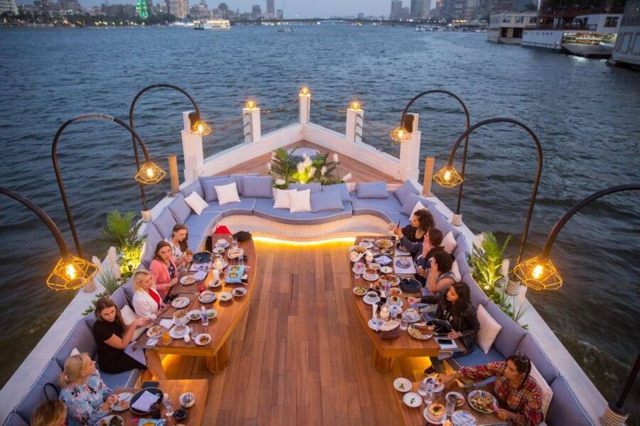 Cairo: Nile Dinner Cruise with Belly Dancer Show and Music - The upper deck and Cairo after dark
