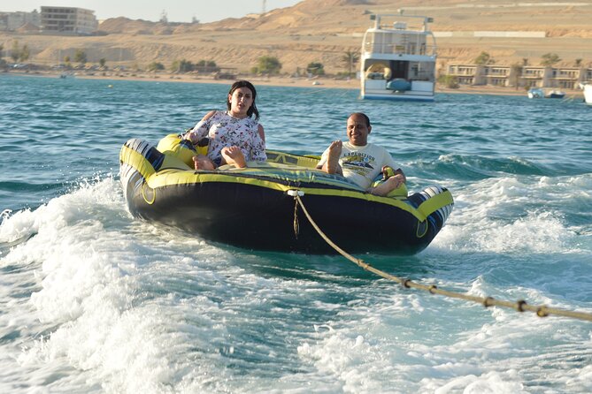 Dolphin House Snorkeling Sea Trip, Water Sport , Lunch - Hurghada - Banana boats, sofa rides, and a little noise
