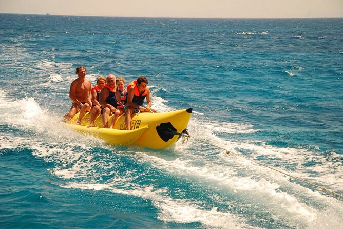 Dolphin tour & banana boat fun with snorkeling from Hurghada - Lunch, soft drinks, and life aboard the boat