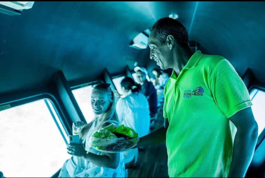 From El Gouna: Royal Seascope Submarine with Snorkel Stop - Languages, seating, and family appeal