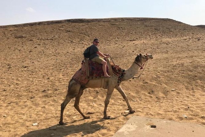 Giza Pyramids and Sphinx half day tour - The Sphinx and its long burial under sand