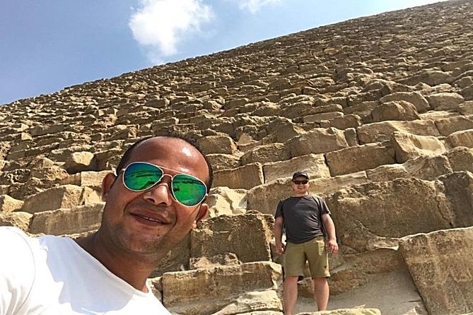 Giza Pyramids and Sphinx half day tour - Seeing the Great Pyramid and its neighbors