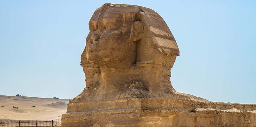 Giza: Pyramids at Sunset Guided Camel Tour - Seeing the Great Sphinx up close