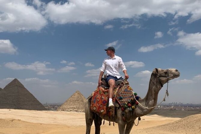 Half Day private guided tour Giza Pyramids,Sphinx,lunch,camel rid - A four-hour introduction to Giza