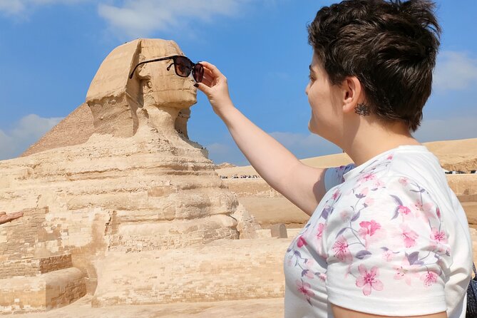 Half day Pyramids of Giza and Sphinx with Camel ride - A private start in Cairo