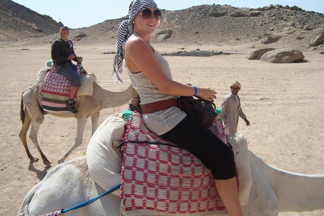 Hurghada: ATV Quad Safari, Camel Ride & Bedouin Village Tour - Barbecue, drinks, and an evening show