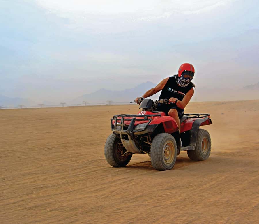 Hurghada: Desert Quad, Bedouin Village, and Camel Ride Tour - Two hours between the Red Sea mountains