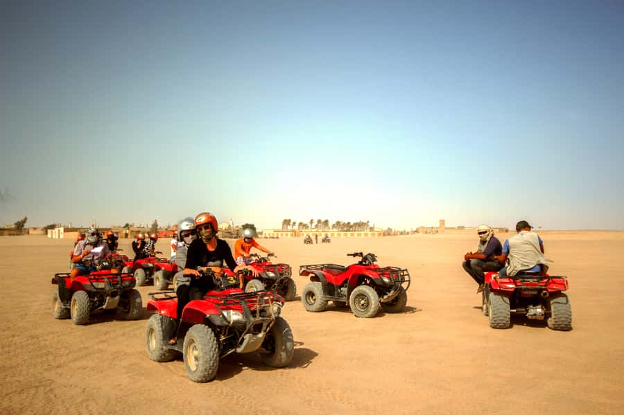 Hurghada: Desert Quad Bike Camel Ride with Optional GoPro - Sunrise, sunset, and the evening program