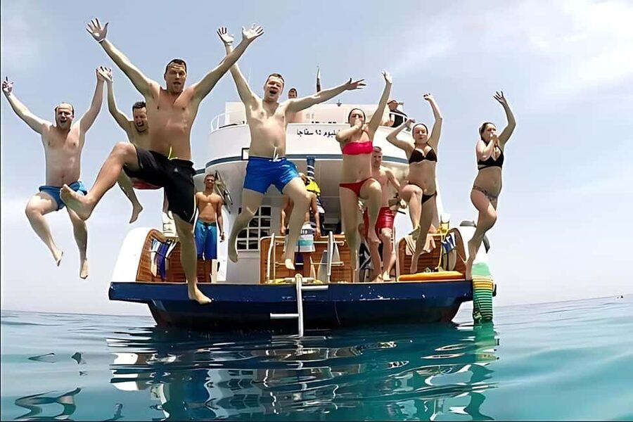 Hurghada: Dolphin Cruise with Snorkeling & Buffet Lunch - Lunch, soft drinks, and time on deck