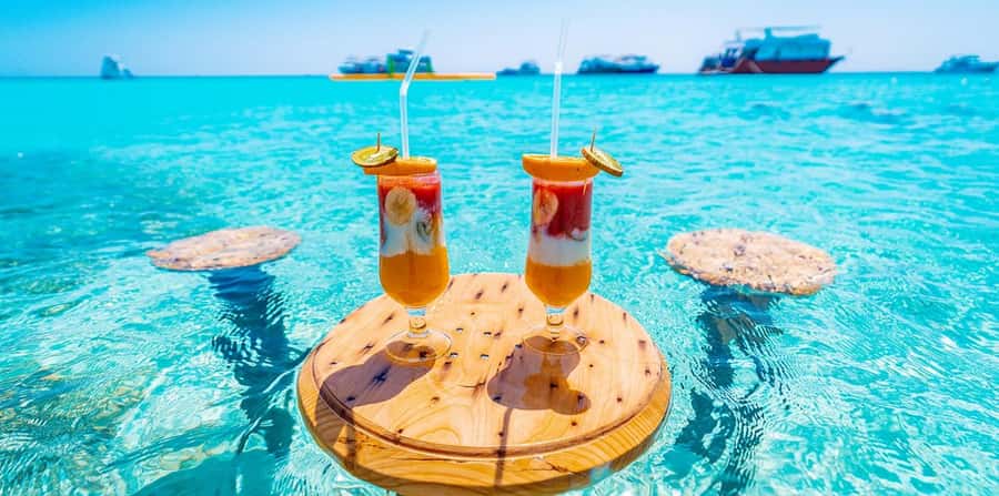 Hurghada: Hula Hula Island Boat Trip with Snorkeling & Lunch - Banana boat, sofa boat, and the short massage