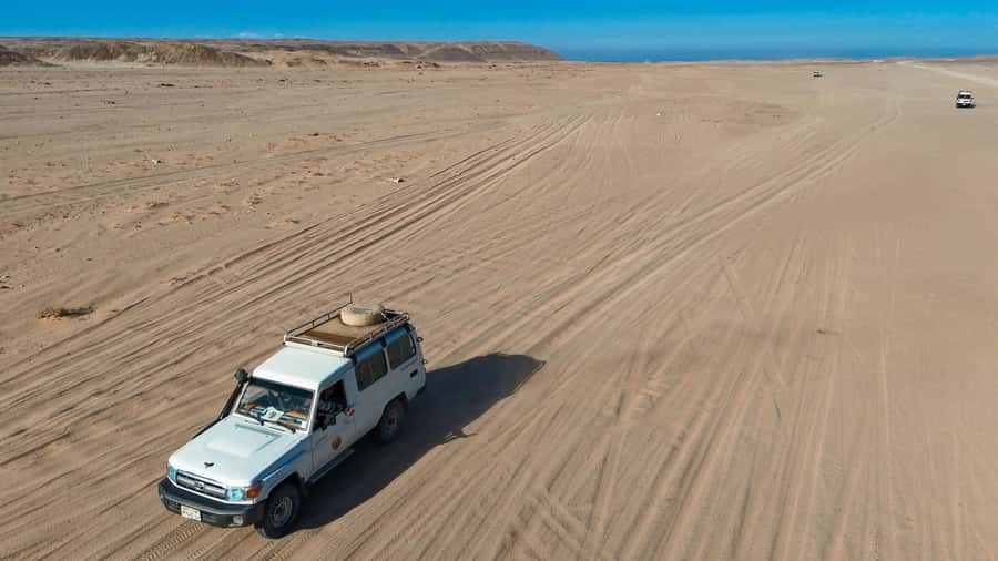 Hurghada: Jeep Safari with Camel Ride, Dinner and Show - Arabian tea and the Bedouin village visit