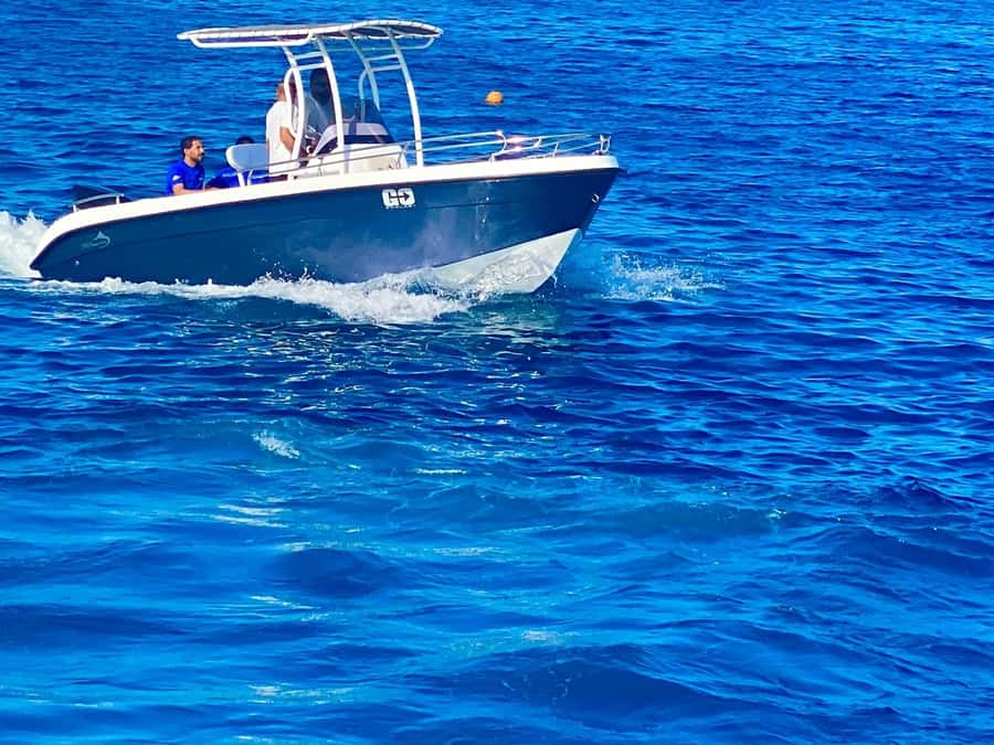 Hurghada: Orange Bay Dolphin Watching, Snorkeling & Lunch - Two snorkeling stops in clear Red Sea water