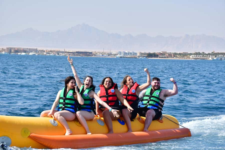 Hurghada: Orange Bay Island with breakfast, lunch & watersports - Breakfast, fruit, and drinks before the reef