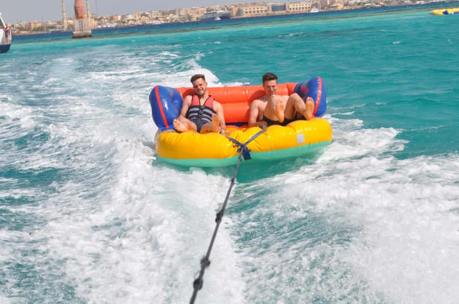 Hurghada: Orange & Giftun Island Cruise with Massage & Lunch - Leaving shore on a spacious yacht