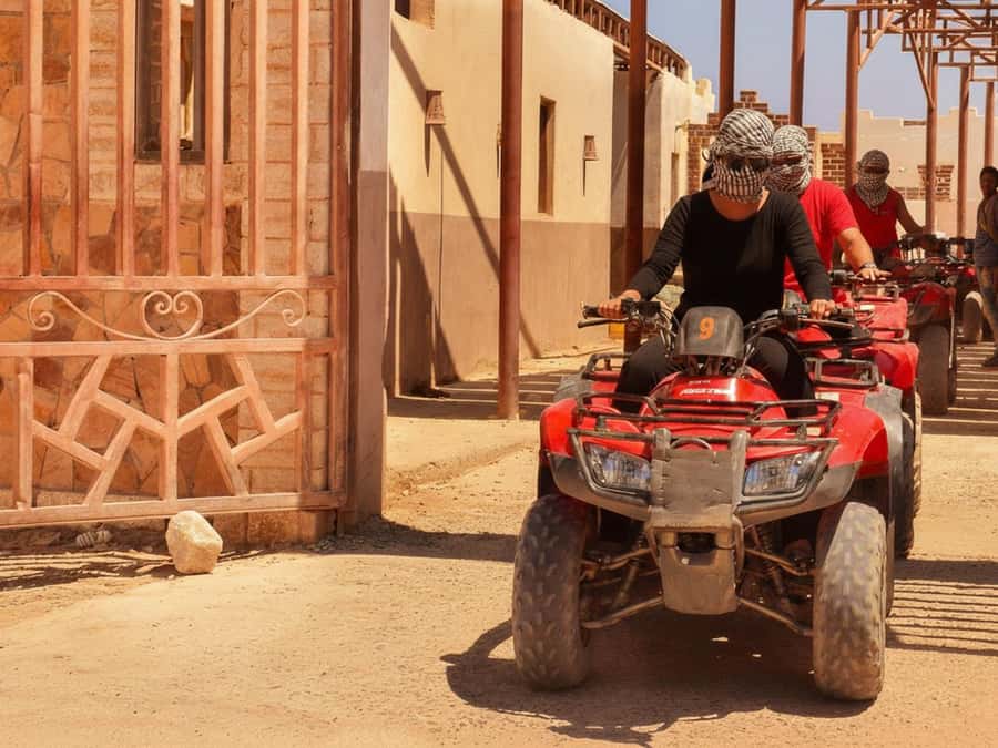 Hurghada: Sunset Quad Bike, Camel w/ Opt Stargazing and BBQ - Reaching the desert base from Hurghada