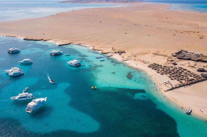 Orange Bay Island Snorkeling Trip With Water Sports - Hurghada - Two reef stops, with a guide in the water