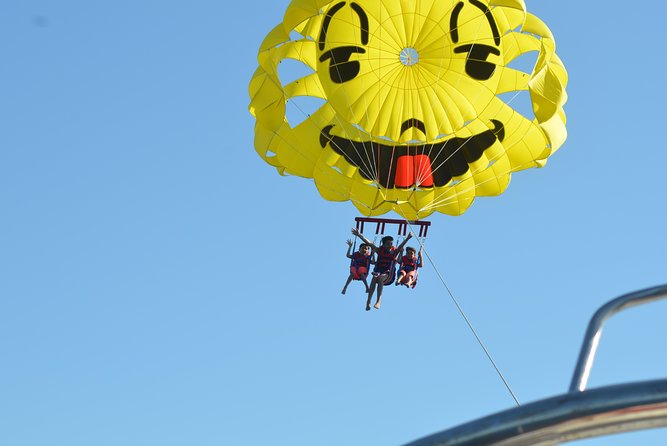 Parasailing Fly to The Sky On Marine - Hurghada - Getting strapped into the parasail