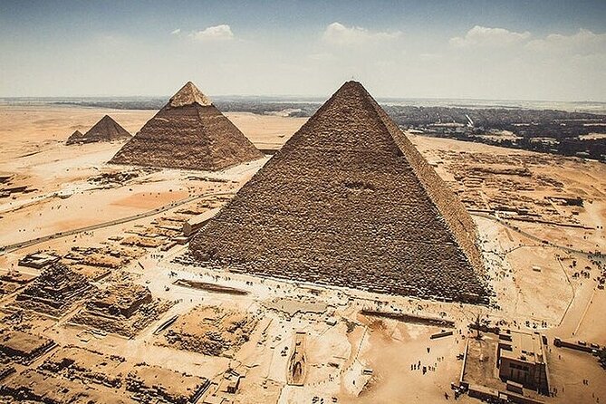 Private Day Tour Giza, Sakkara Pyramids, Memphis includes Lunch. - Giza Pyramids: the essential first stop