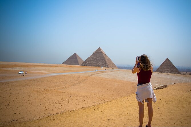 Private Day Tour of Giza Pyramids, Egyptian Museum, and Bazaar" - Hotel pickup and the first ride to Giza