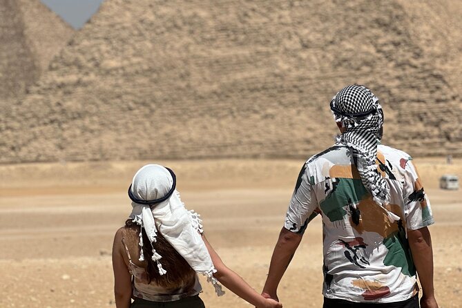 Private Half Day Giza Pyramids Tour with camel & Lunch - What the private guide adds