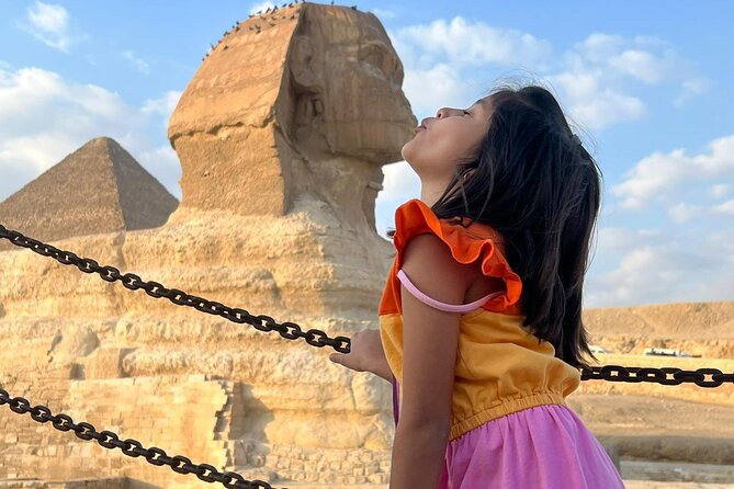 Private Half Day Giza Pyramids Tour with camel & Lunch - The Great Sphinx and its many questions