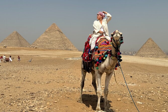 Private tour Giza Pyramids ,sphinx & camel ride all included - Hotel pickup starts the day simply