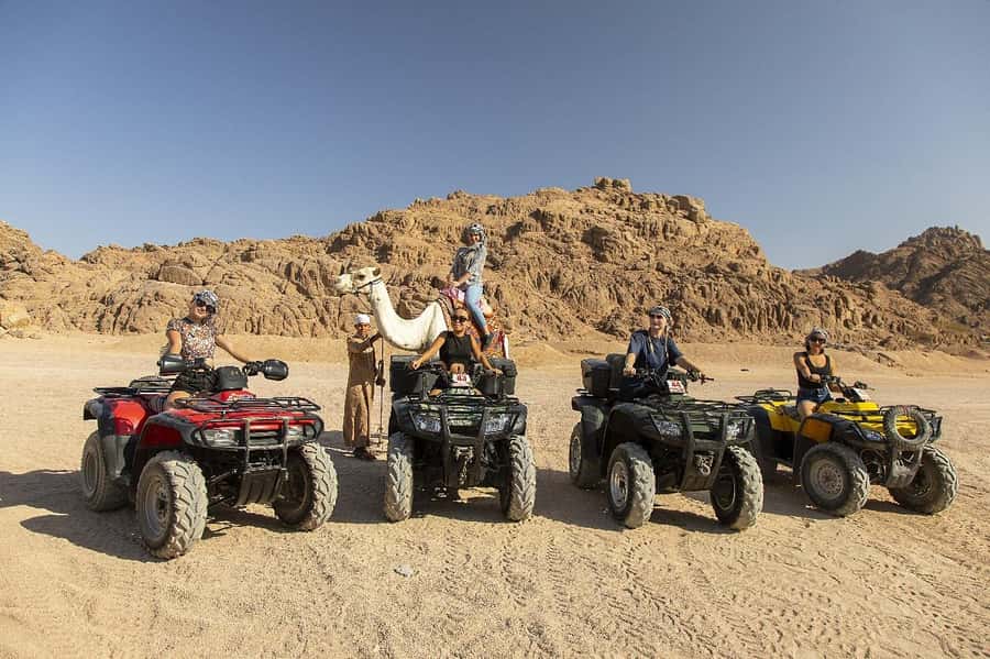 Sharm El Sheikh: Quad Biking & Desert Safari with Pickup - Riding through dunes, open sand, and mountain views