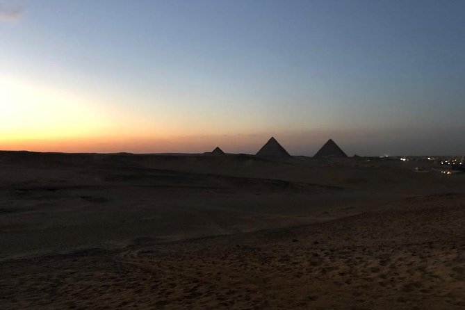 sunset at Giza pyramids by camels - Photographing the pyramids at golden hour