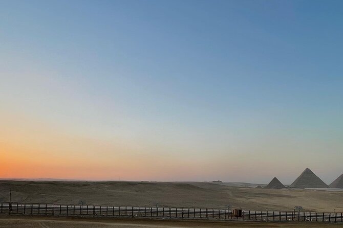 sunset at Giza pyramids by camels - Tea with the Bedouin camel handlers