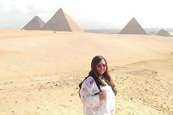 Top rated Giza Pyramids and Sphinx Tour from Cairo Airport - A 30-minute camel ride with a time warning