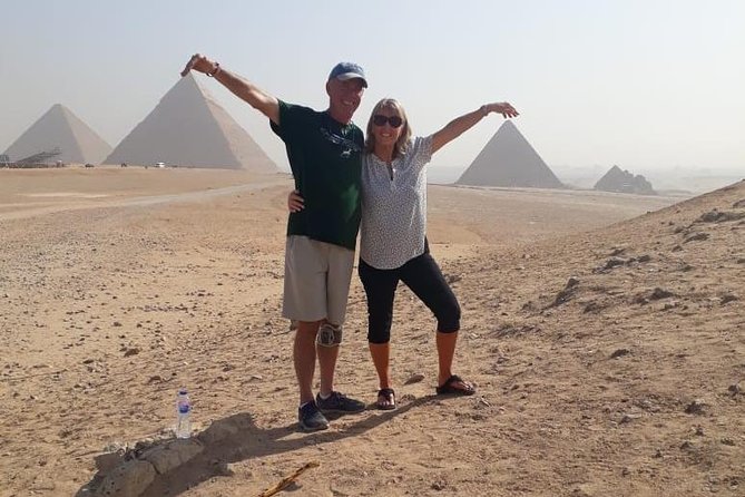 Top rated Giza Pyramids and Sphinx Tour from Cairo Airport - Lunch with a view of the pyramids