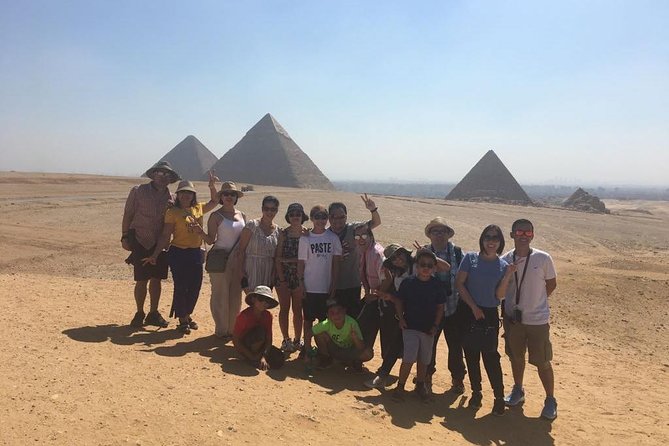 Top rated Giza Pyramids and Sphinx Tour from Cairo Airport - Guides, drivers, and the feel of the day