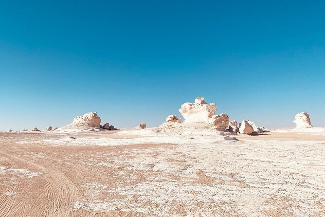 White & Black Desert tour 2 Days 1 night camping from Cairo. - Sunset, campfire dinner, and a cold night outdoors